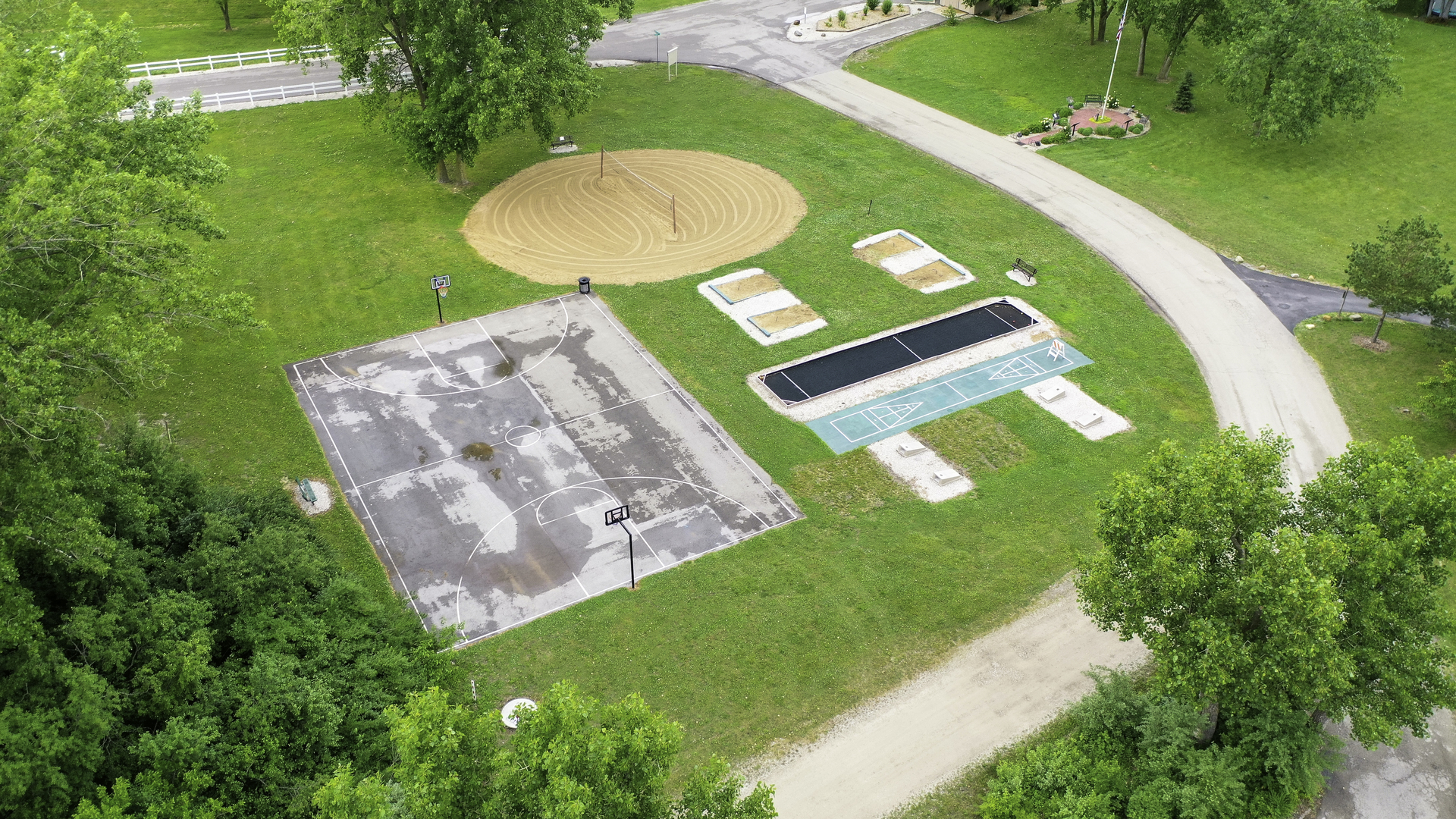 59 Dinosaur Road Wilmington, IL 60481 - Photo 16 of 17 a view of a pool with a yard