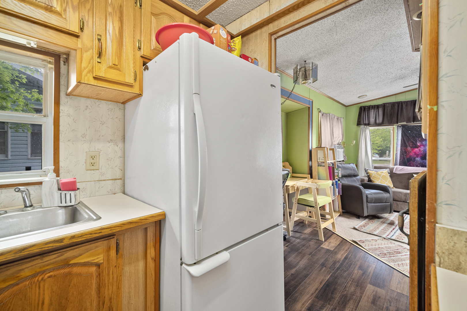 59 Dinosaur Road Wilmington, IL 60481 - Photo 6 of 17 a kitchen with stainless steel appliances a refrigerator and a stove