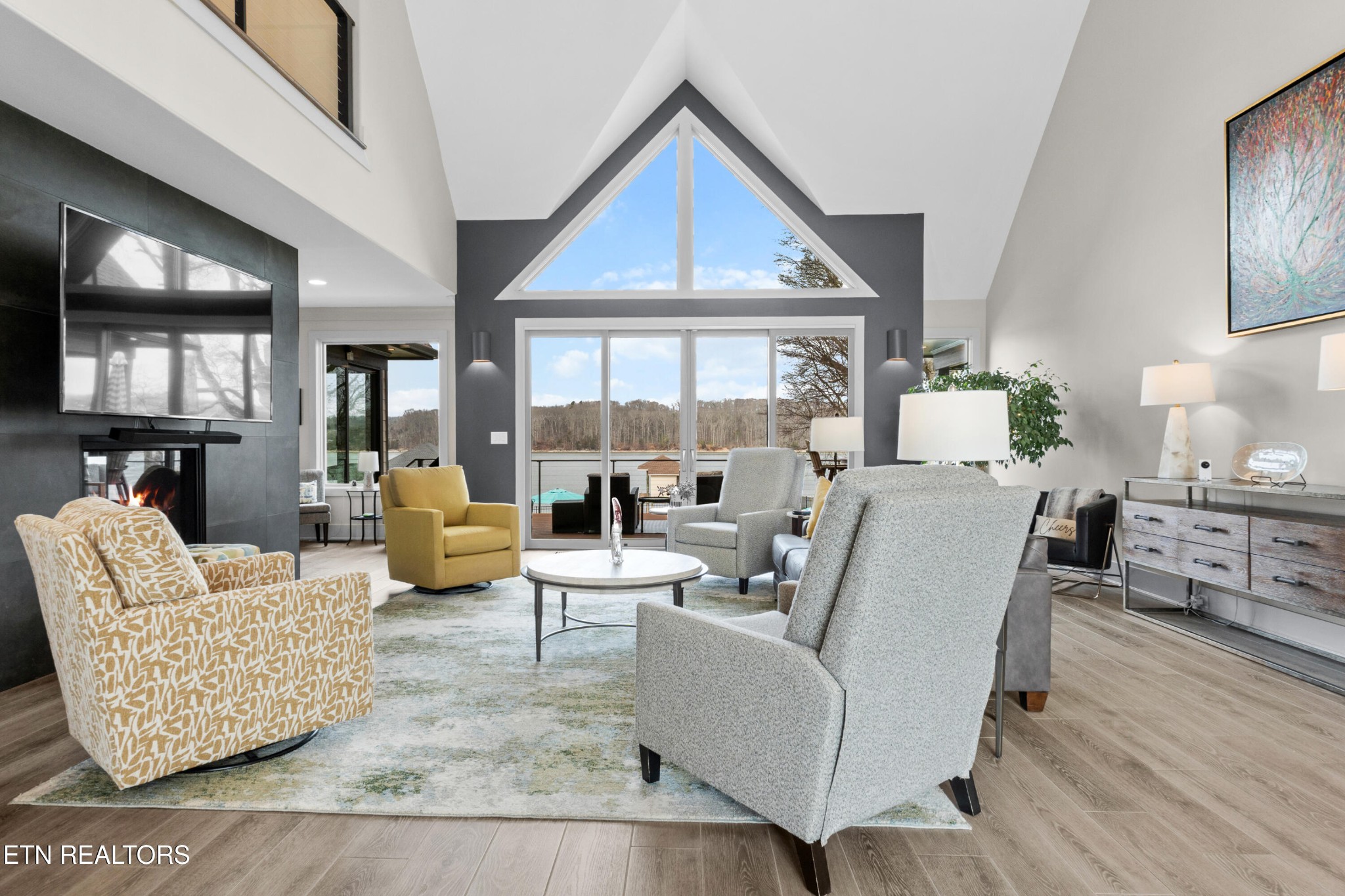 3702 Promontory Point Louisville, TN 37777 - Photo 3 of 60 a living room with furniture and a large window