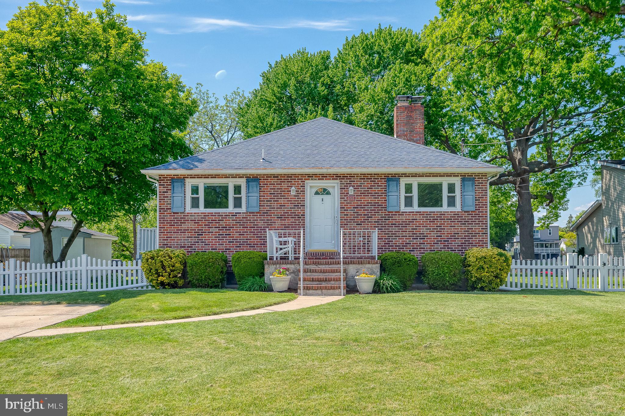 2222 Monocacy Road Essex, MD 21221 - Photo 1 of 70 Charming brick home with lush greenery.
