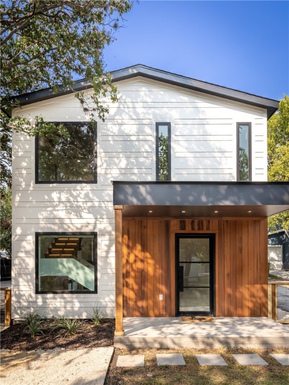 a front view of a house with a garage