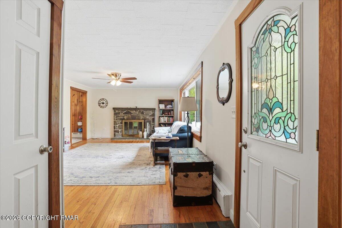 232 Garrity Road Hawley, PA 18428 - Photo 16 of 57 a very nice looking room with a large window and wooden floor