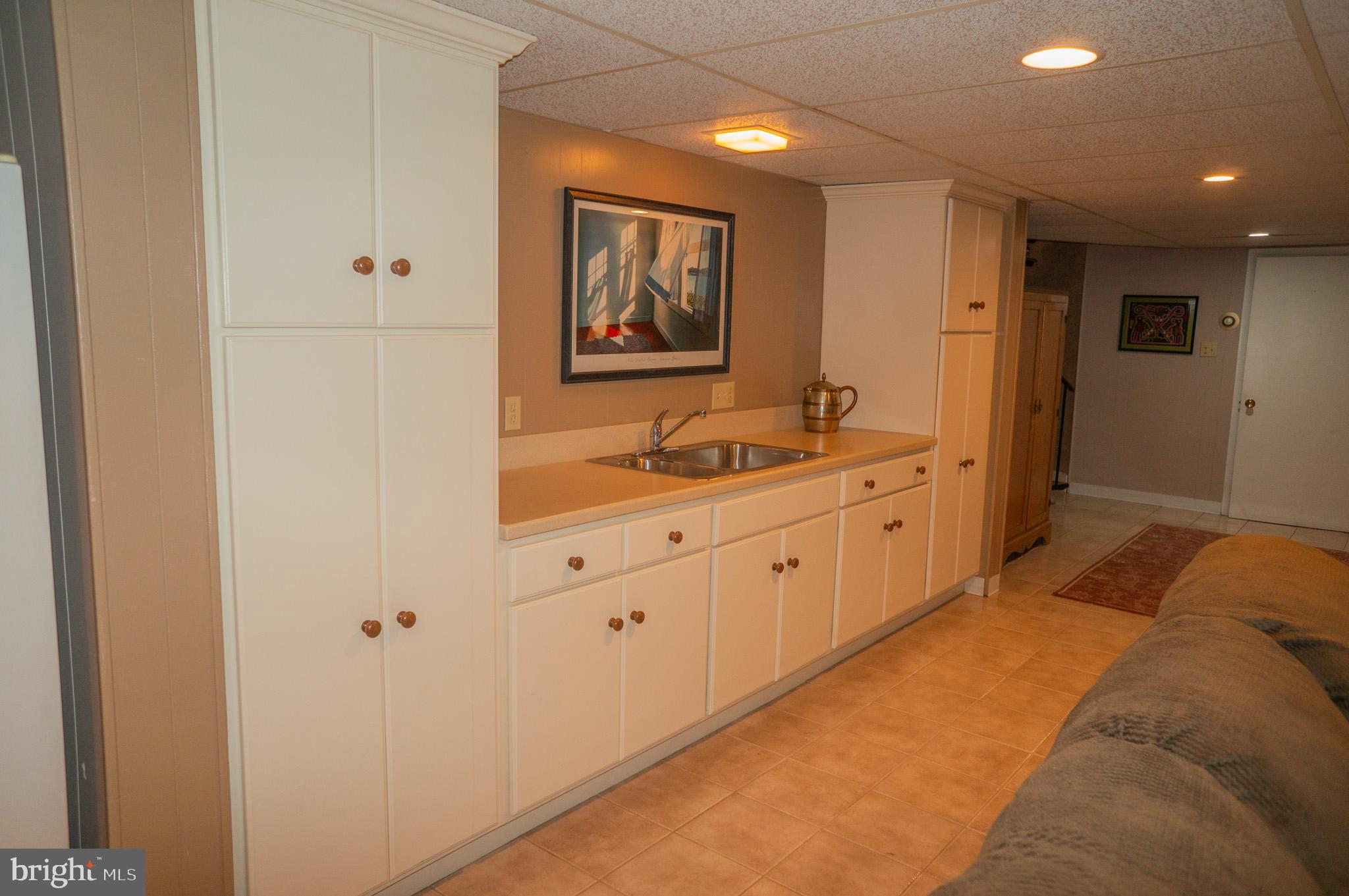 389 Basehoar Road Littlestown, PA 17340 - Photo 50 of 101 Custom cabinets and sink in lower level