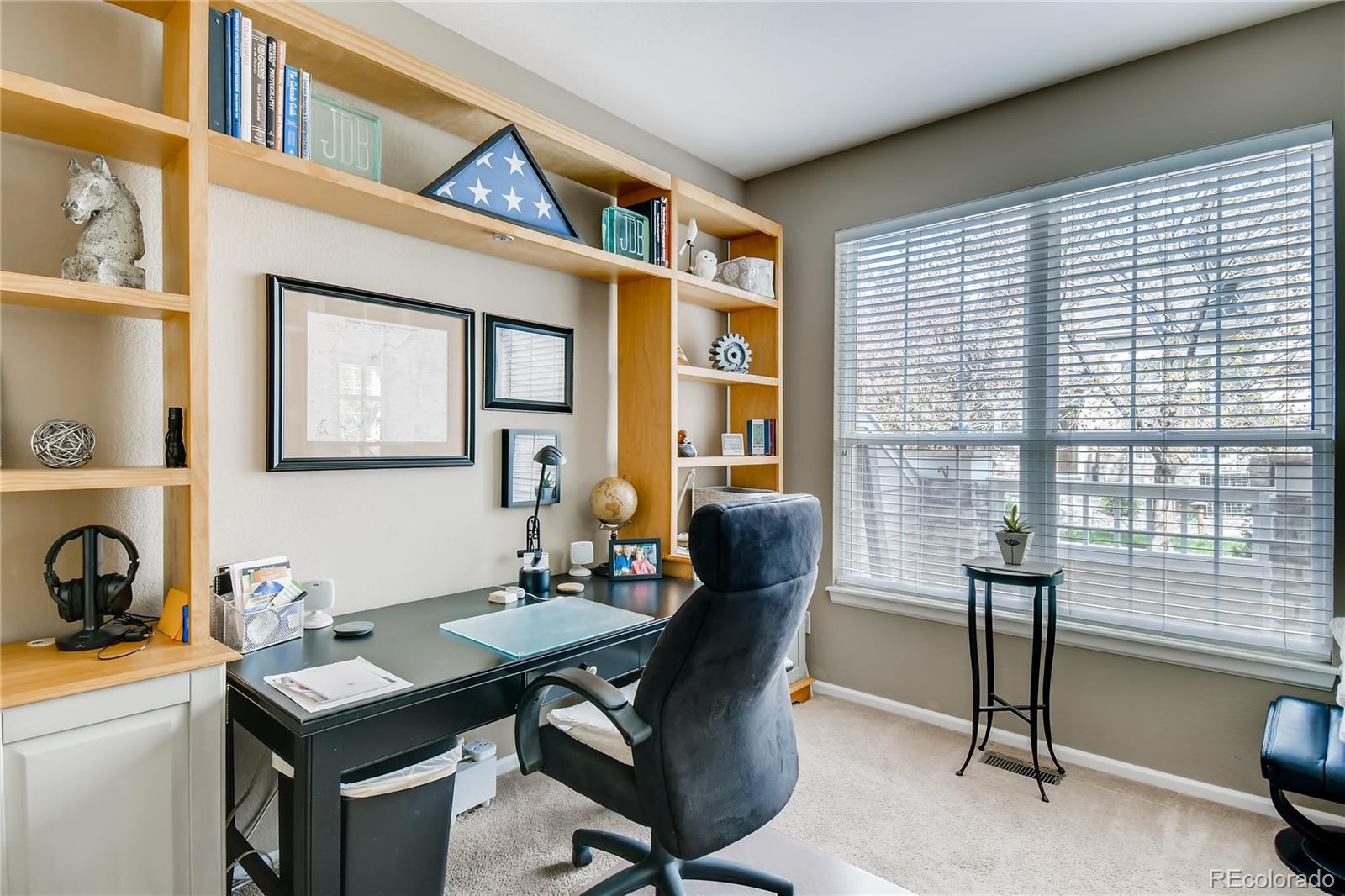 6214 Trailhead Road Highlands Ranch, CO 80130 - Photo 13 of 29 a view of a dining room with furniture and a window