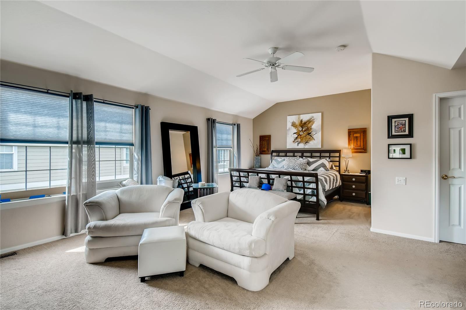 6214 Trailhead Road Highlands Ranch, CO 80130 - Photo 16 of 29 a living room with furniture and a large window