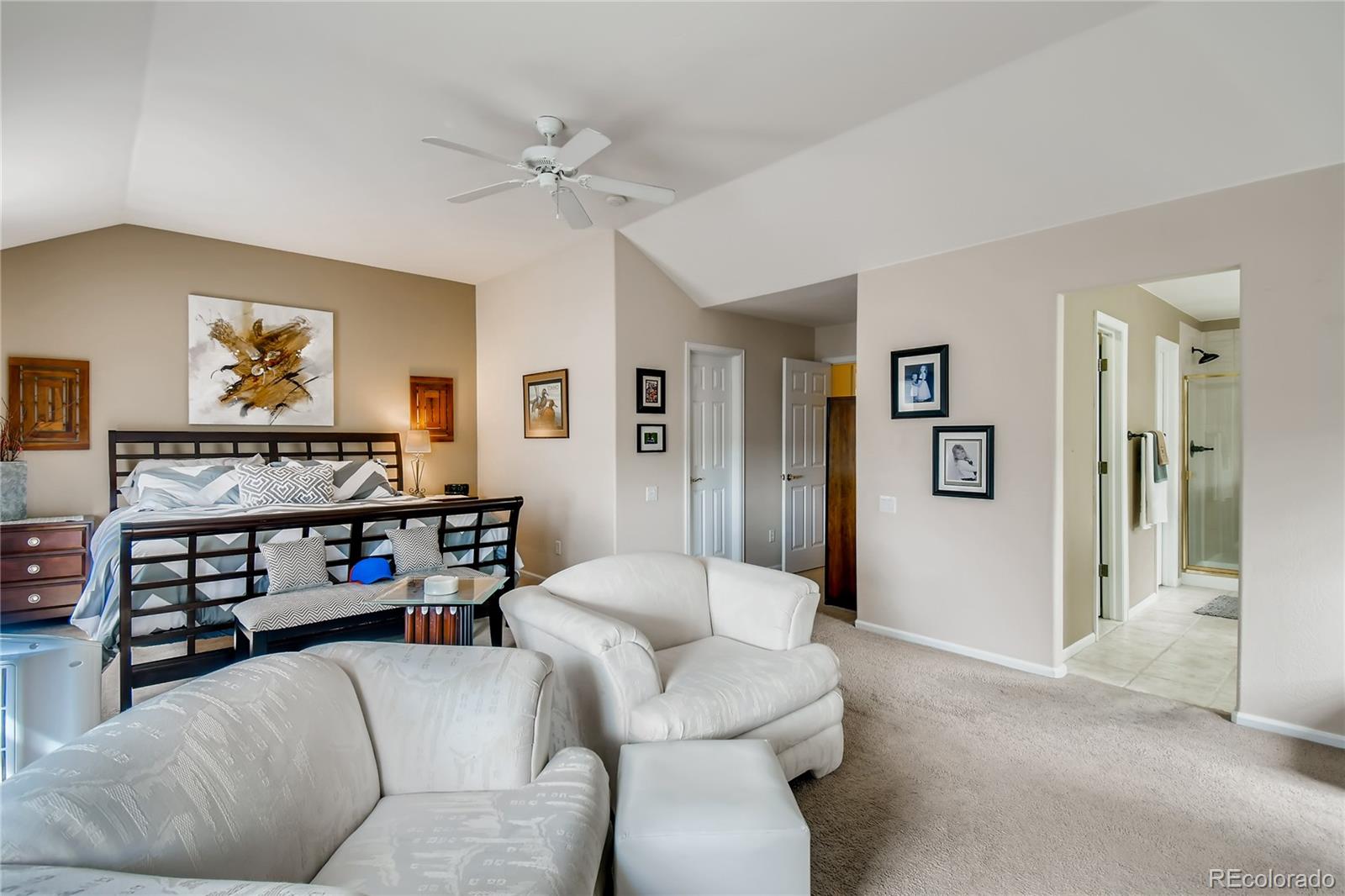 6214 Trailhead Road Highlands Ranch, CO 80130 - Photo 19 of 29 a living room with furniture and a flat screen tv