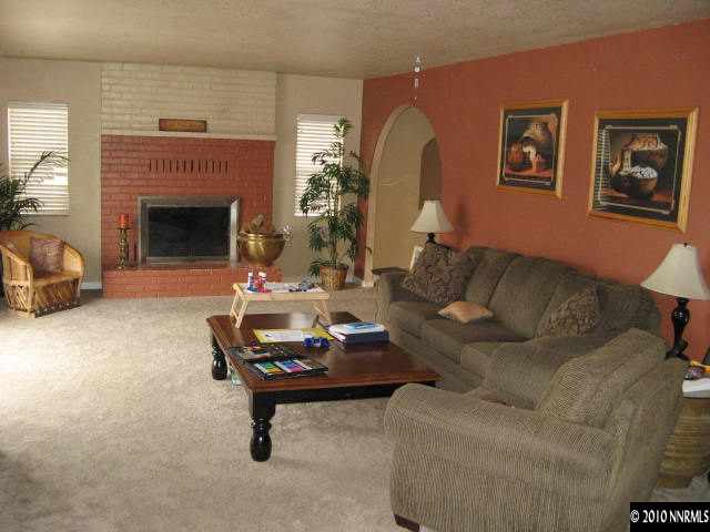 3050 Heights Reno, NV 89503 - Photo 6 of 9 a living room with furniture and a fireplace