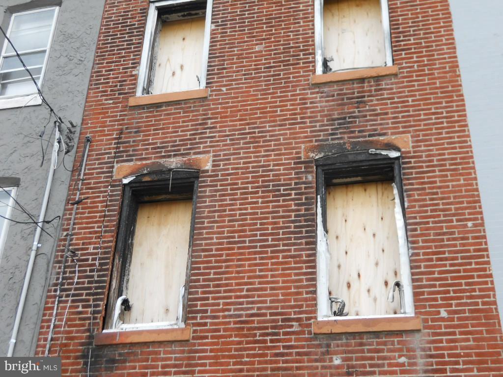 2033 North 9th Street Philadelphia, PA 19122 - Photo 9 of 14 Front exterior fire damage