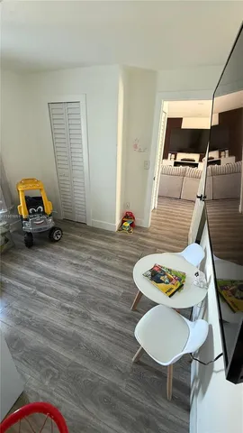 a car wooden floor and table in a room