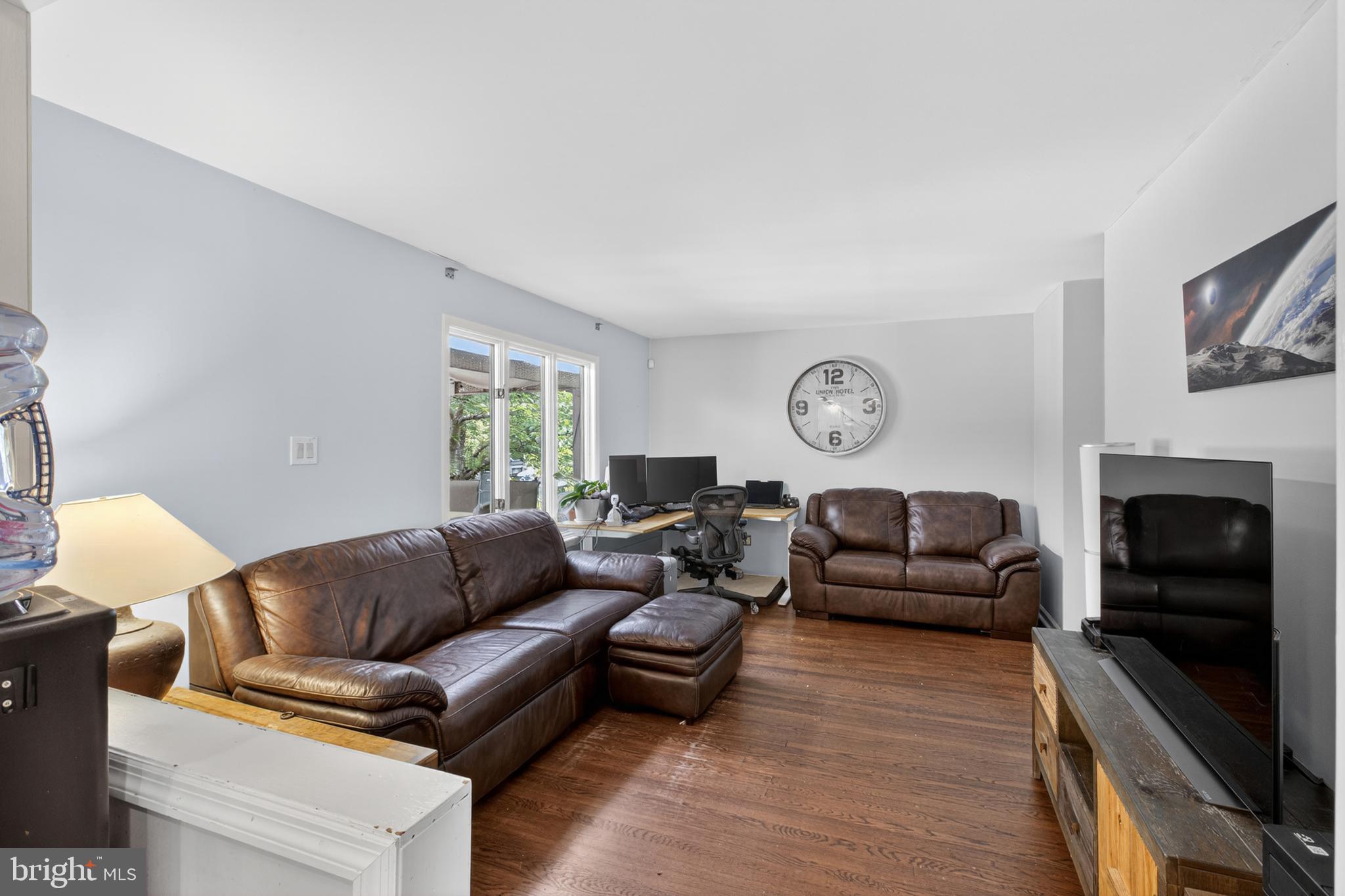 216 Revere Road Marlton, NJ 08053 - Photo 5 of 47 a living room with furniture and a fireplace