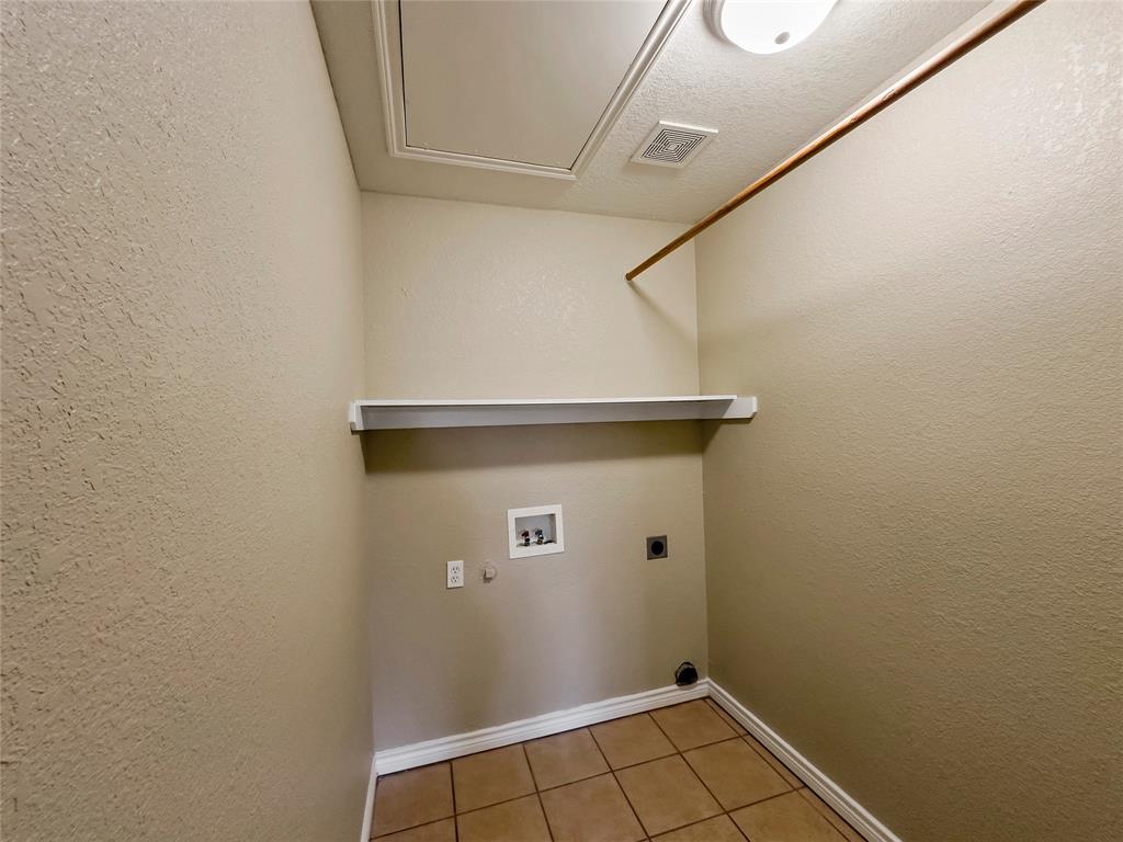 225 Oak Court, Unit 225 Rhome, TX 76078 - Photo 20 of 30 a view of utility room