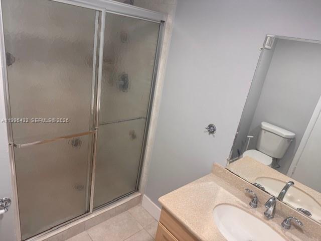 16300 Golf Club Road, Unit 208 Weston, FL 33326 - Photo 13 of 24 a bathroom with a sink and toilet