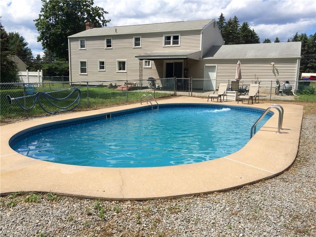 90 Brainard Road Enfield, CT 06082 - Photo 1 of 1 a view of a house with swimming pool