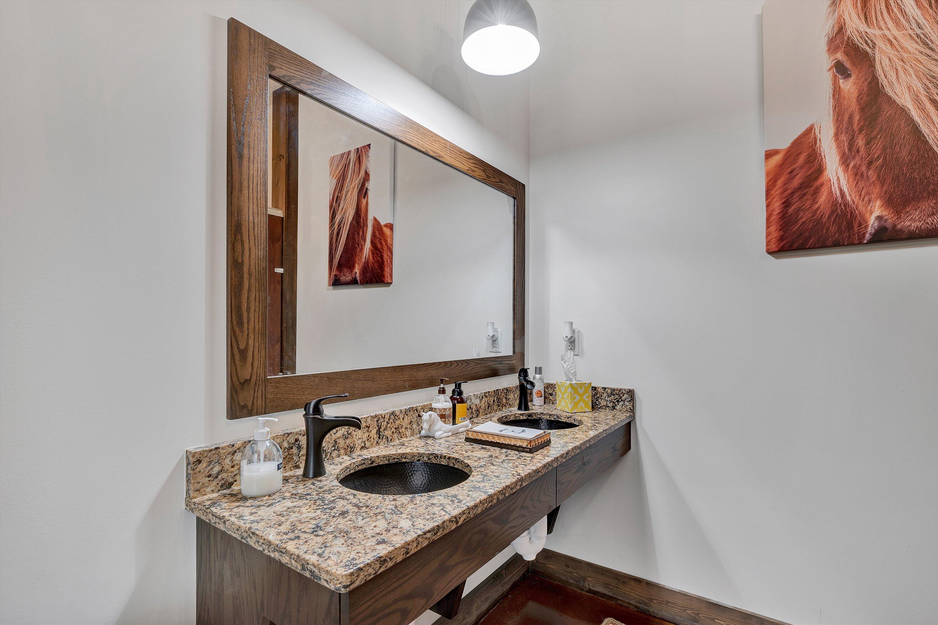 9945 Brooks Mill Road Wirtz, VA 24184 - Photo 29 of 69 a bathroom with a granite countertop sink and a mirror