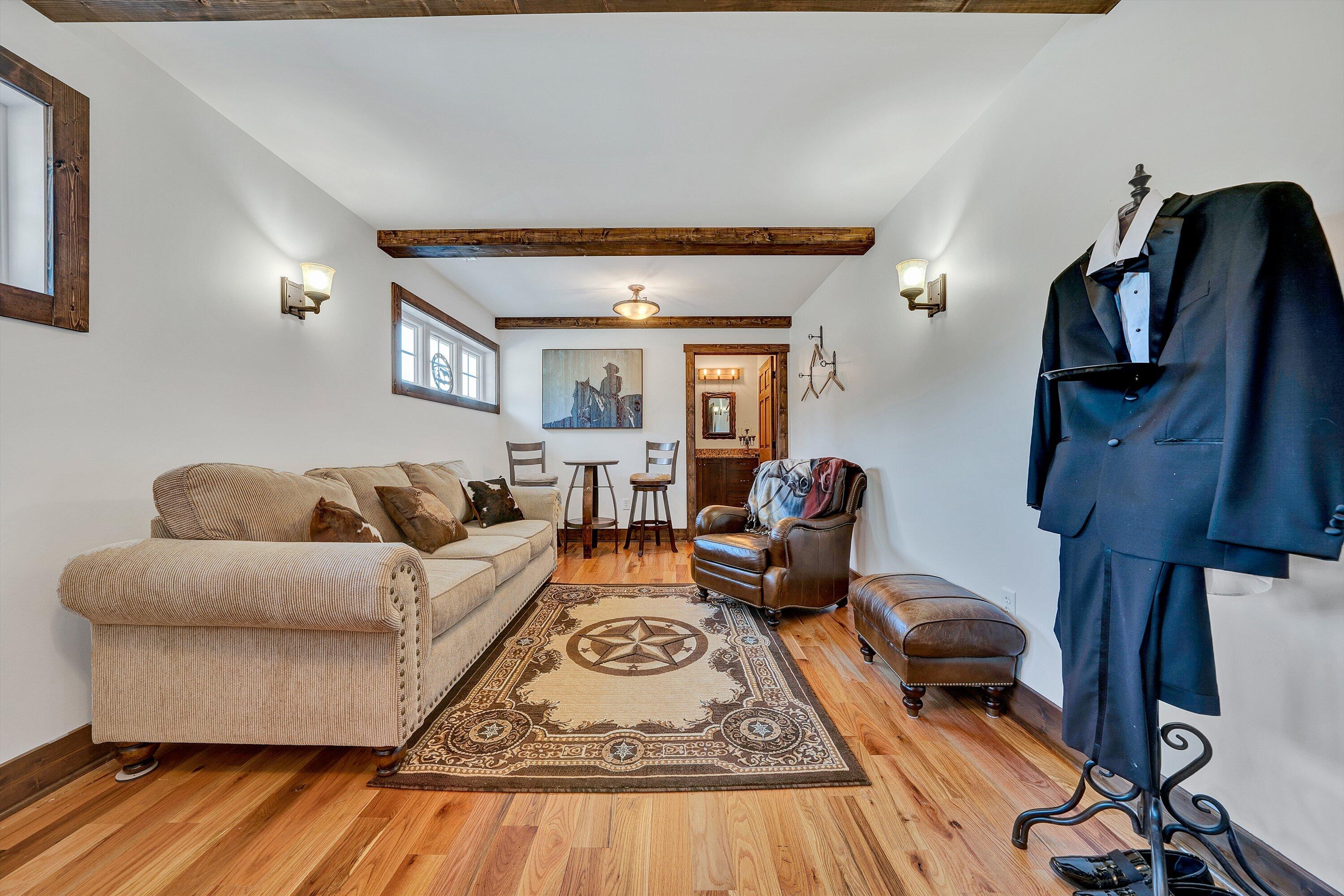 9945 Brooks Mill Road Wirtz, VA 24184 - Photo 32 of 69 a living room with furniture and a wooden floor