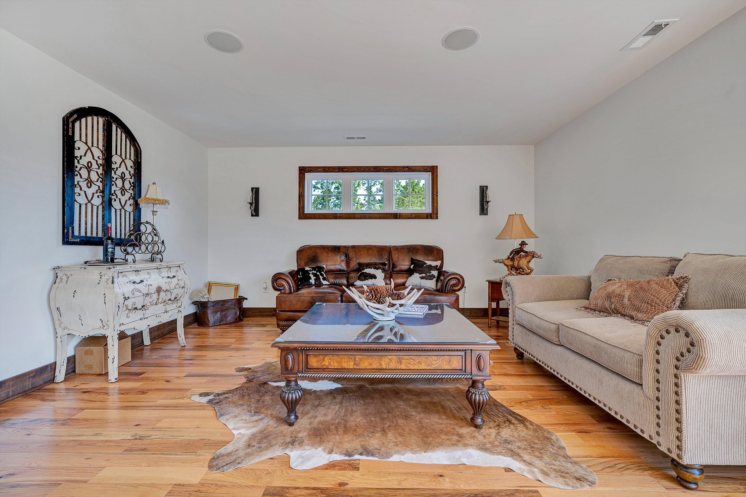 9945 Brooks Mill Road Wirtz, VA 24184 - Photo 50 of 69 a living room with furniture and wooden floor