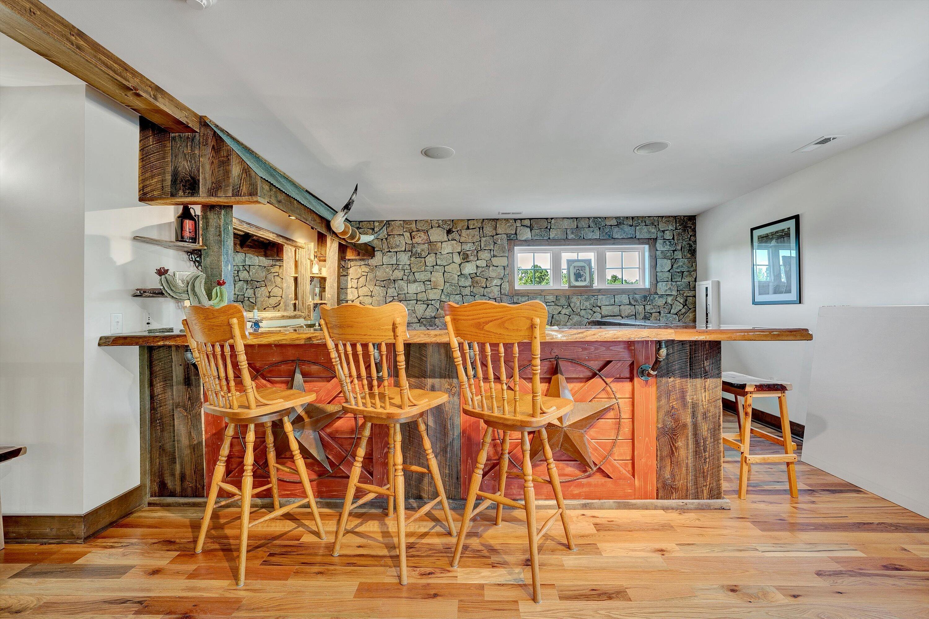 9945 Brooks Mill Road Wirtz, VA 24184 - Photo 59 of 69 a view of a dining room with furniture and wooden floor