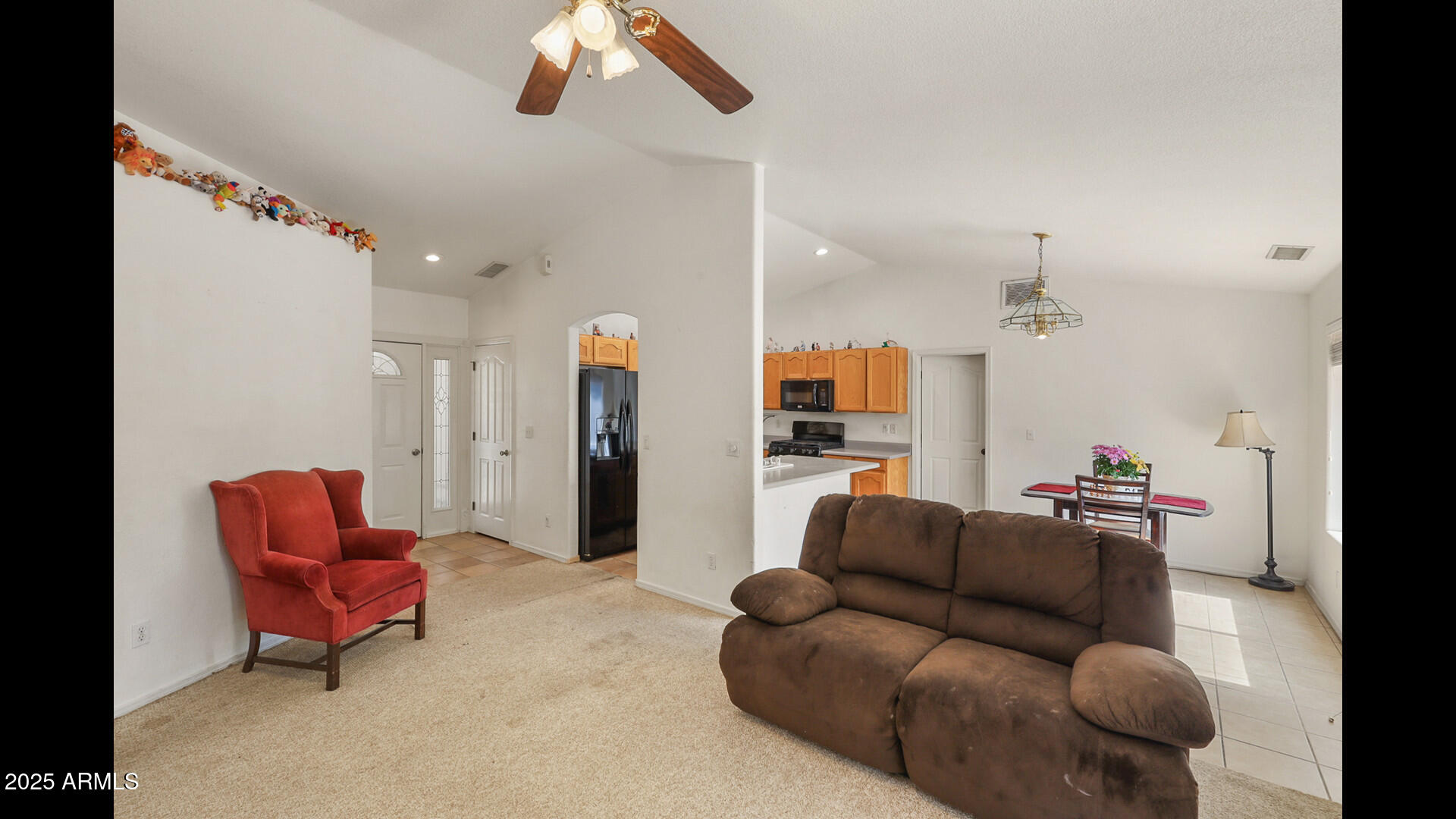 510 North Oak Ridge Road Payson, AZ 85541 - Photo 12 of 36 a living room with furniture and a flat screen tv