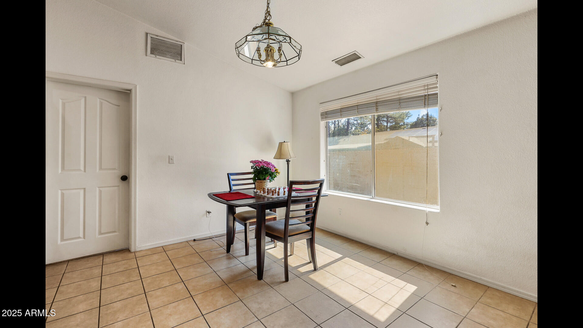 510 North Oak Ridge Road Payson, AZ 85541 - Photo 16 of 36 a view of a dining room with furniture and window