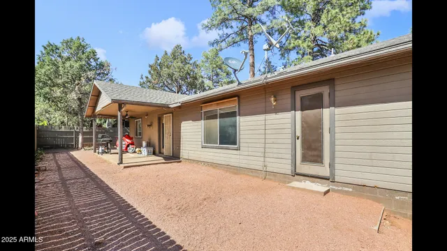 a view of sitting area in front of house