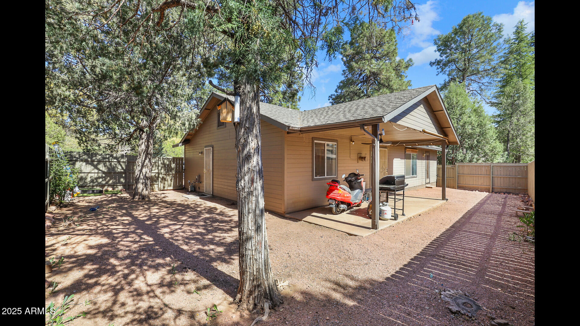 510 North Oak Ridge Road Payson, AZ 85541 - Photo 30 of 36 a view of a house with backyard porch and sitting area