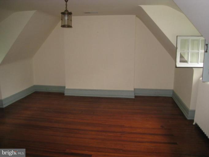 5305 Falls Rd Terrace Baltimore, MD 21210 - Photo 12 of 20 a view of a room with wooden floor
