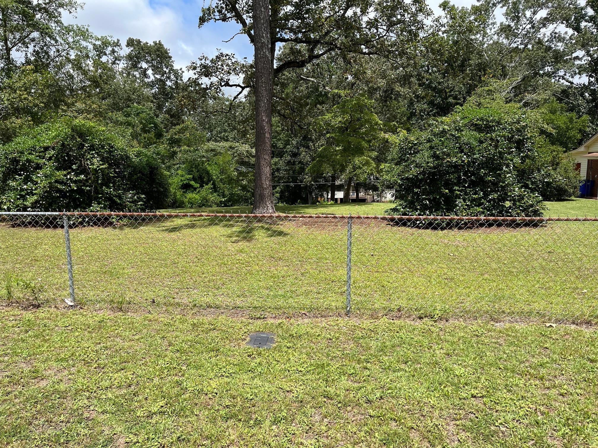 32 Coker Drive Aiken, SC 29803 - Photo 5 of 5 Chain Link Fence across front of lot