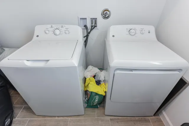 a utility room with dryer and washer