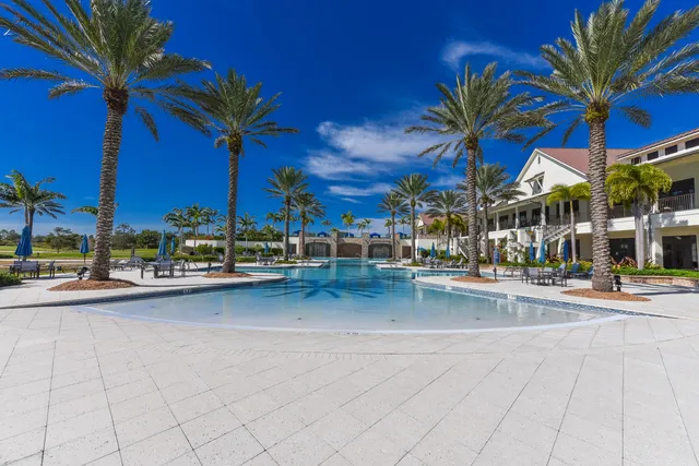 a view of a swimming pool with a patio