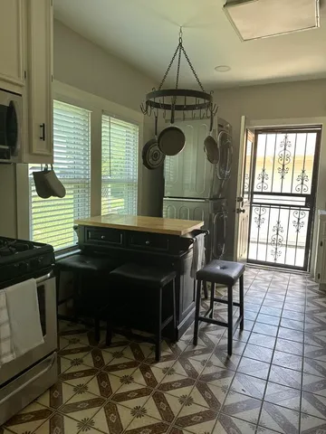 a living room with a couch and a table