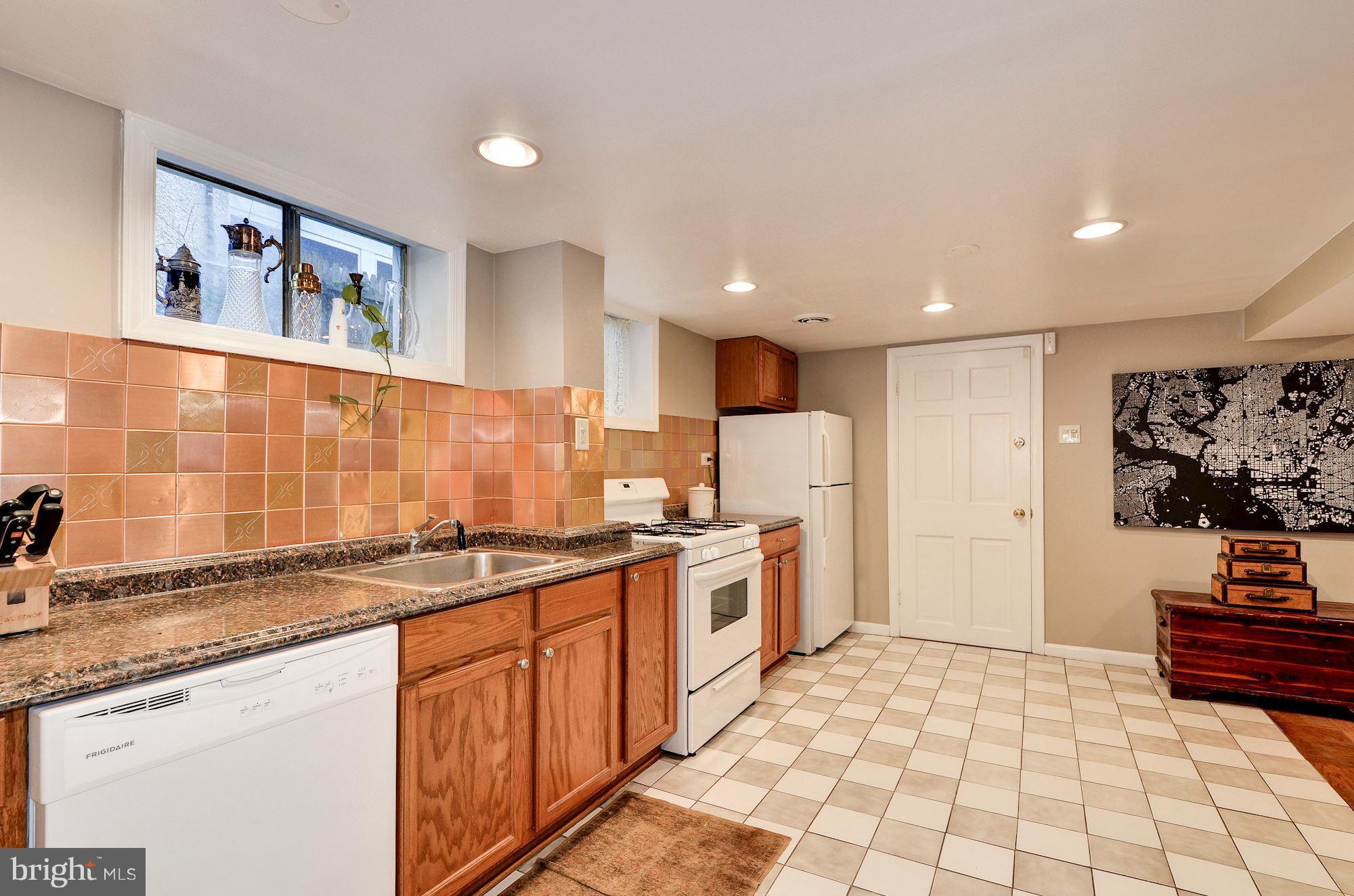 3335 Military Road Northwest Washington, DC 20015 - Photo 26 of 30 Basement Kitchen with Separate Entrance