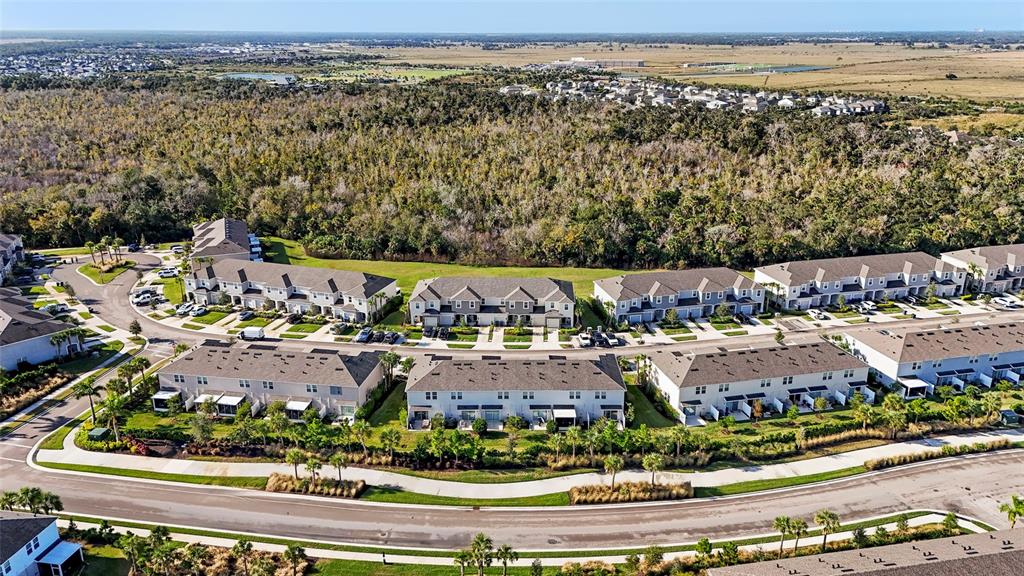 8564 Lunar Skye Street Sarasota, FL 34241 - Photo 40 of 44 an aerial view of residential houses with outdoor space