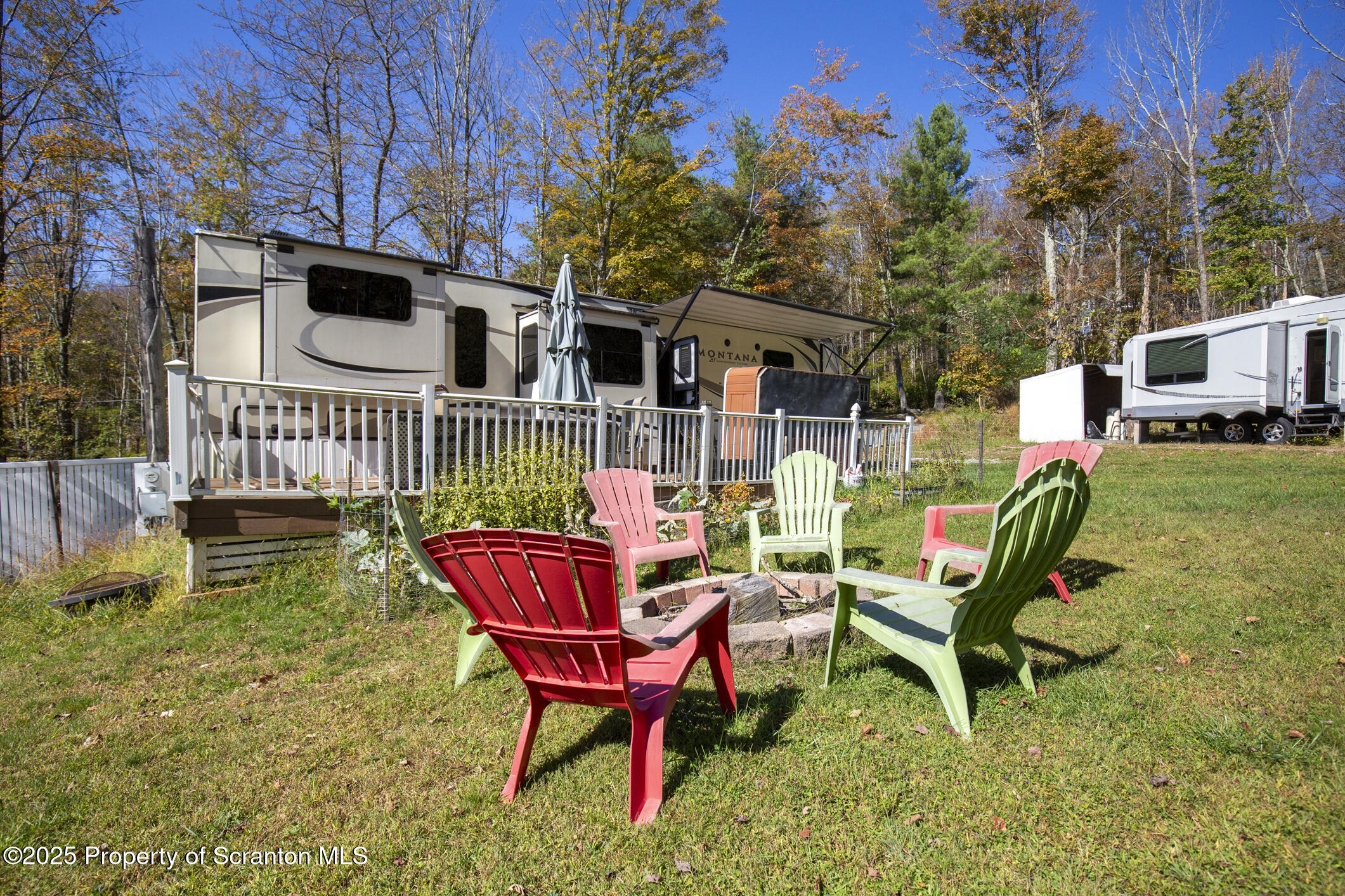 0 Lacawac Road Lake Ariel, PA 18436 - Photo 13 of 66 a view of a chair and table in backyard of the house