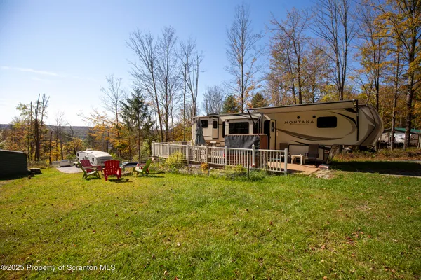 a view of hallway with washer and dryer