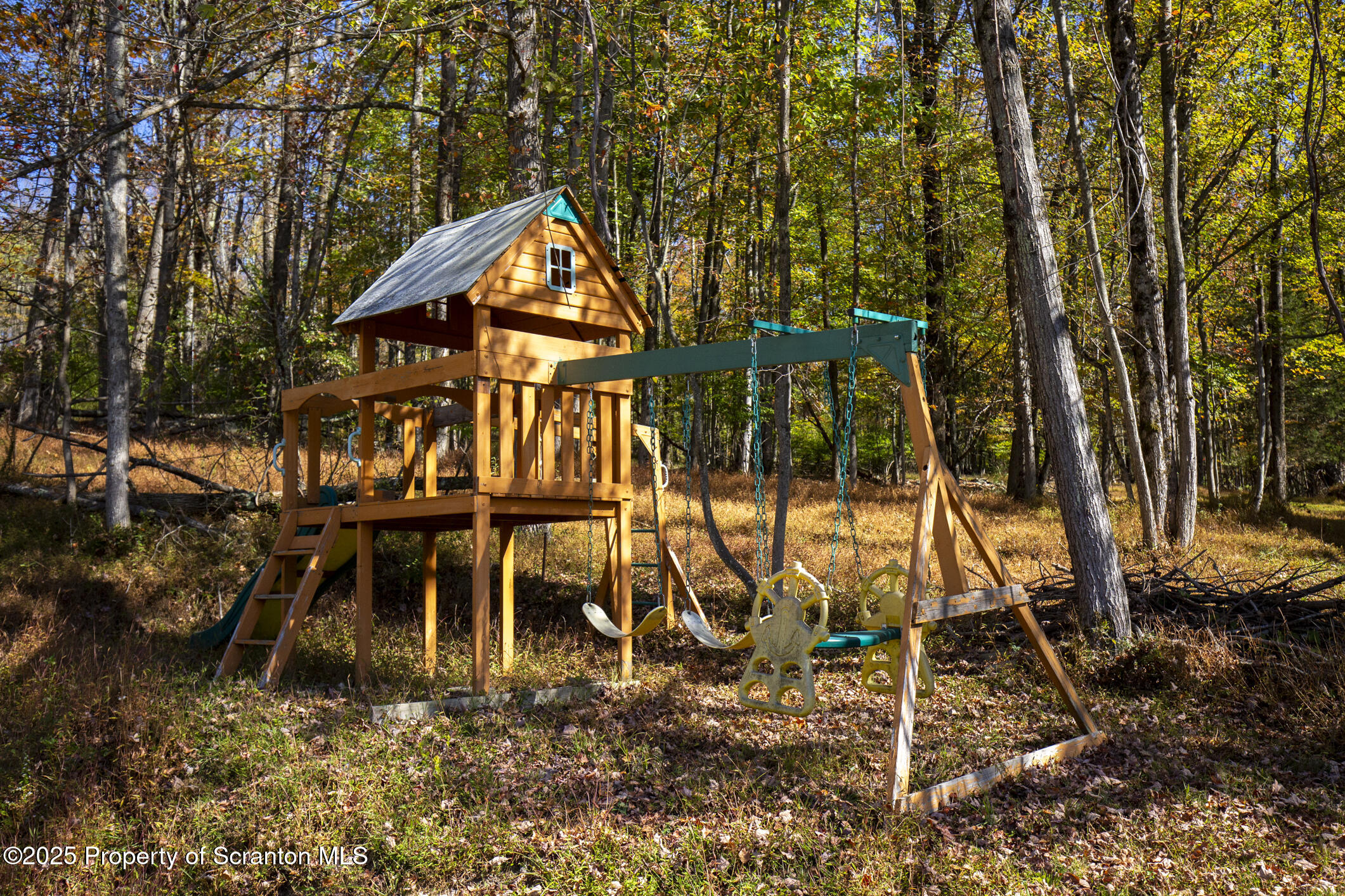 0 Lacawac Road Lake Ariel, PA 18436 - Photo 16 of 66 a backyard of a house with table and chairs