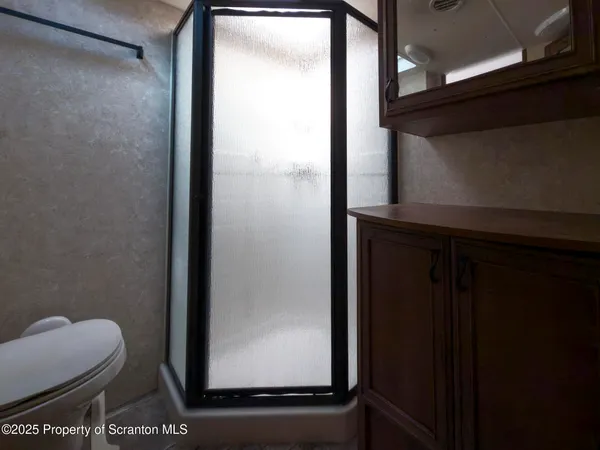 a kitchen with a sink appliances and a counter top space