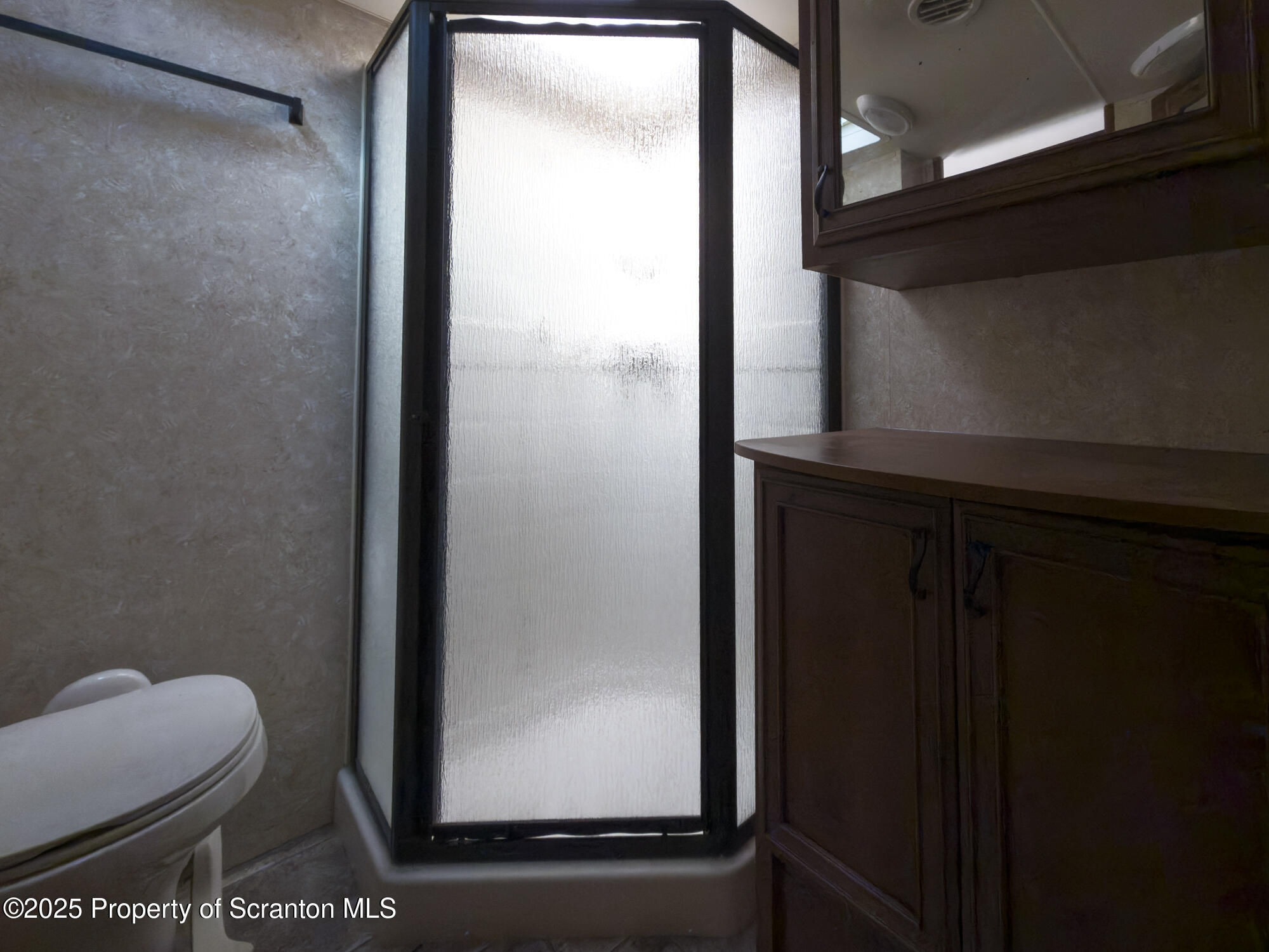0 Lacawac Road Lake Ariel, PA 18436 - Photo 26 of 66 a bathroom with a toilet and a mirror