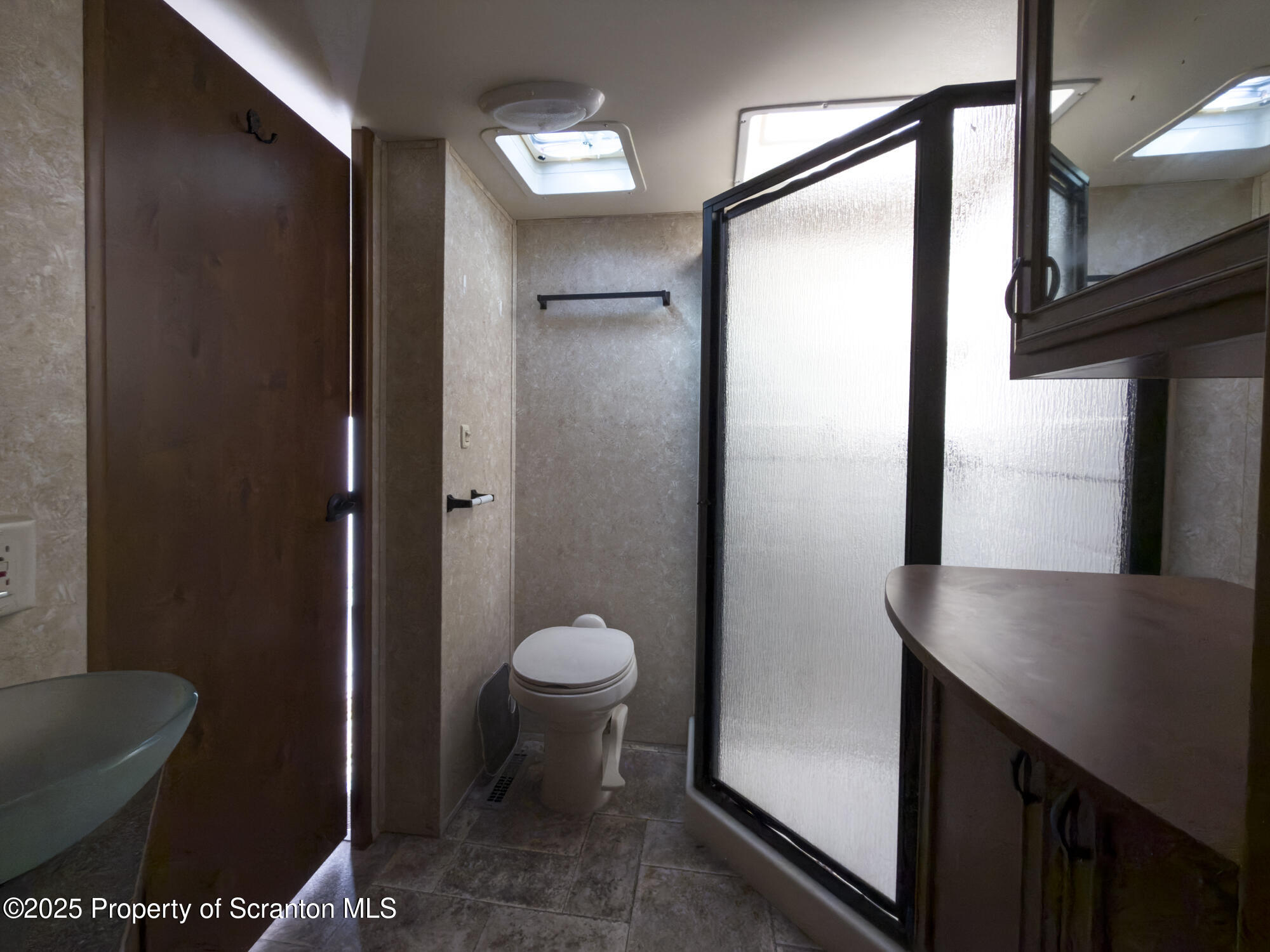 0 Lacawac Road Lake Ariel, PA 18436 - Photo 27 of 66 a bathroom with a sink and a toilet