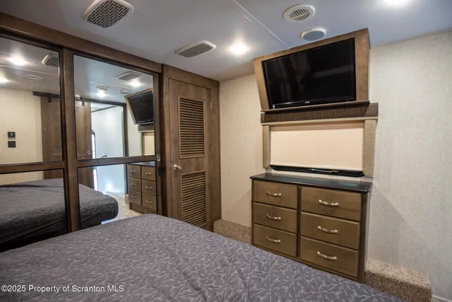 a kitchen with sink cabinets and stainless steel appliances