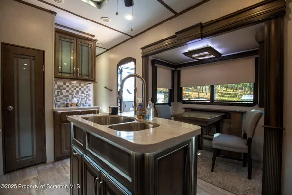 a bed room with a bed and a mirror