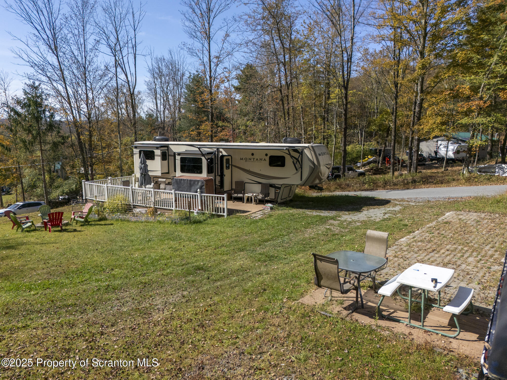0 Lacawac Road Lake Ariel, PA 18436 - Photo 6 of 66 a view of a backyard with sitting area