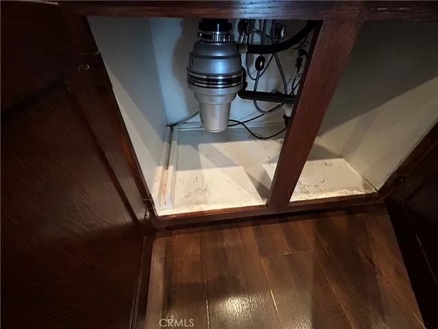 a bathroom with a double vanity sink and mirror