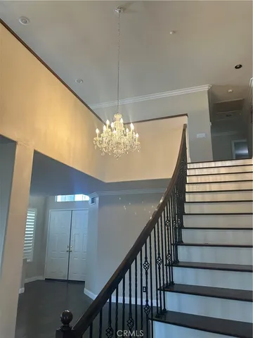 a view of balcony with wooden floor and fence