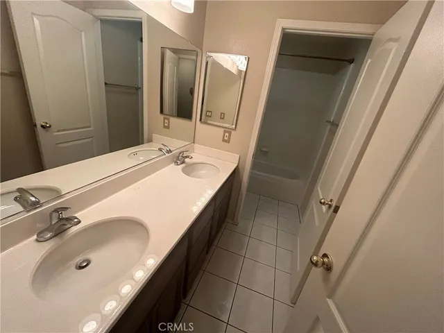a view of a balcony with a tree