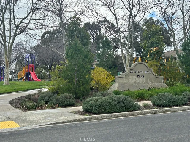 a view of a road with a building in the background