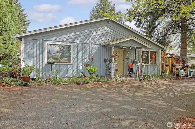 a front view of a house with a garage