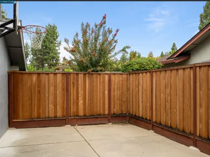 a view of a backyard with a garden