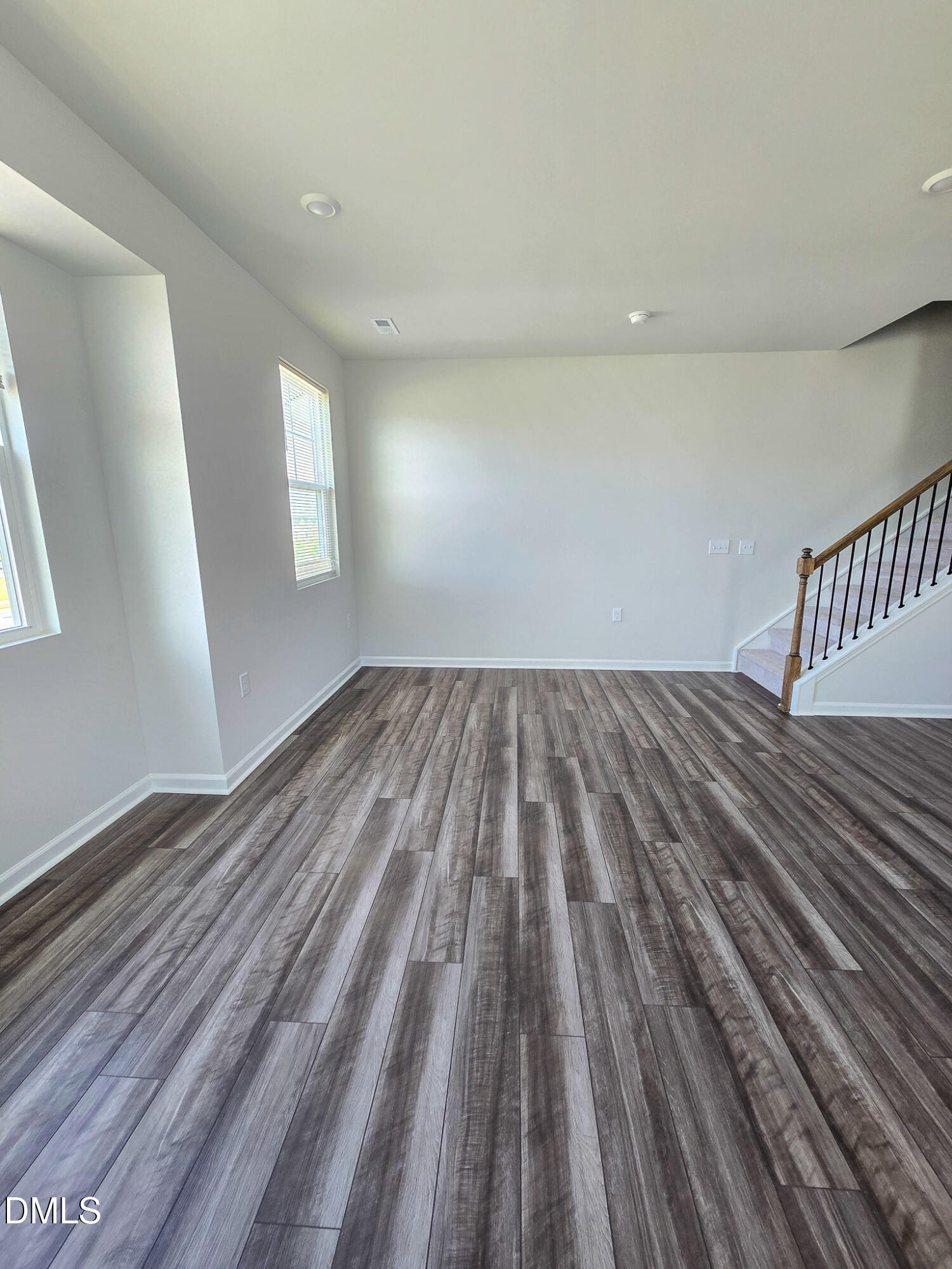2431 Kasota Lane Raleigh, NC 27610 - Photo 19 of 46 wooden floor in a hall with an entryway