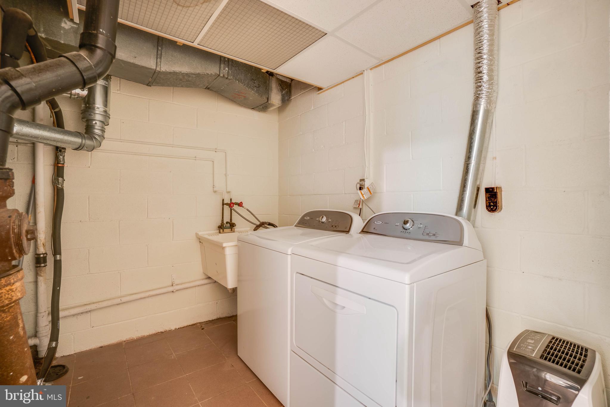 8007 Inverness Ridge Road Potomac, MD 20854 - Photo 26 of 33 Laundry Room