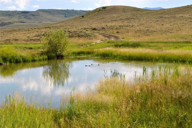 a view of lake with mountain